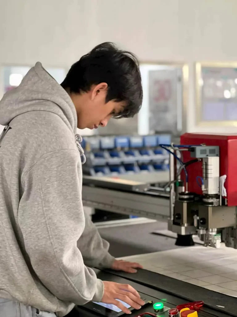 ZINGCUT workshop worker fitting industrial cutting equipment