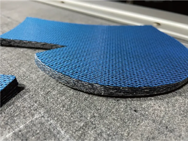  ZINGCUT CNC cut carbon fiber prepreg composite material, showing clean, layered edges of the cut parts ZINGCUT CNC cut carbon fiber prepreg composite material, showing clean, layered edges of the cut parts ZINGCUT CNC cut carbon fiber prepreg composite material, showing clean, layered edges of the cut parts ZINGCUT CNC cut carbon fiber prepreg composite material, showing clean, layered edges of the cut parts