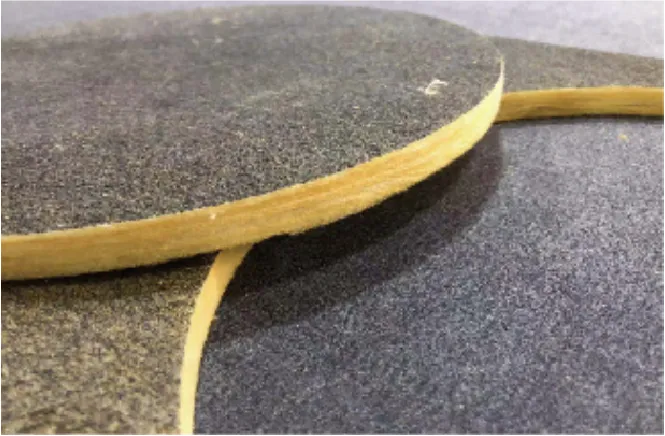ZINGCUT CNC cut fiberglass celloidin composite parts, showing clean, precise layered edges 