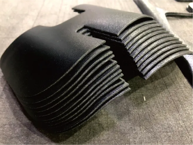 Precision-cut PU composite material parts processed by ZINGCUT CNC cutting machine, showing clean layered edges