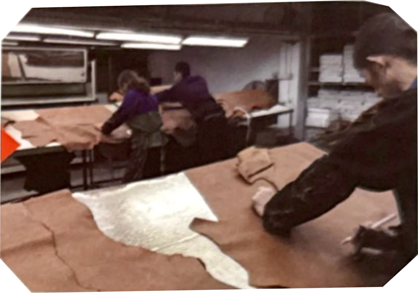 ZINGCUT footwear leather inspection workshop, workers checking raw leather for shoemaking