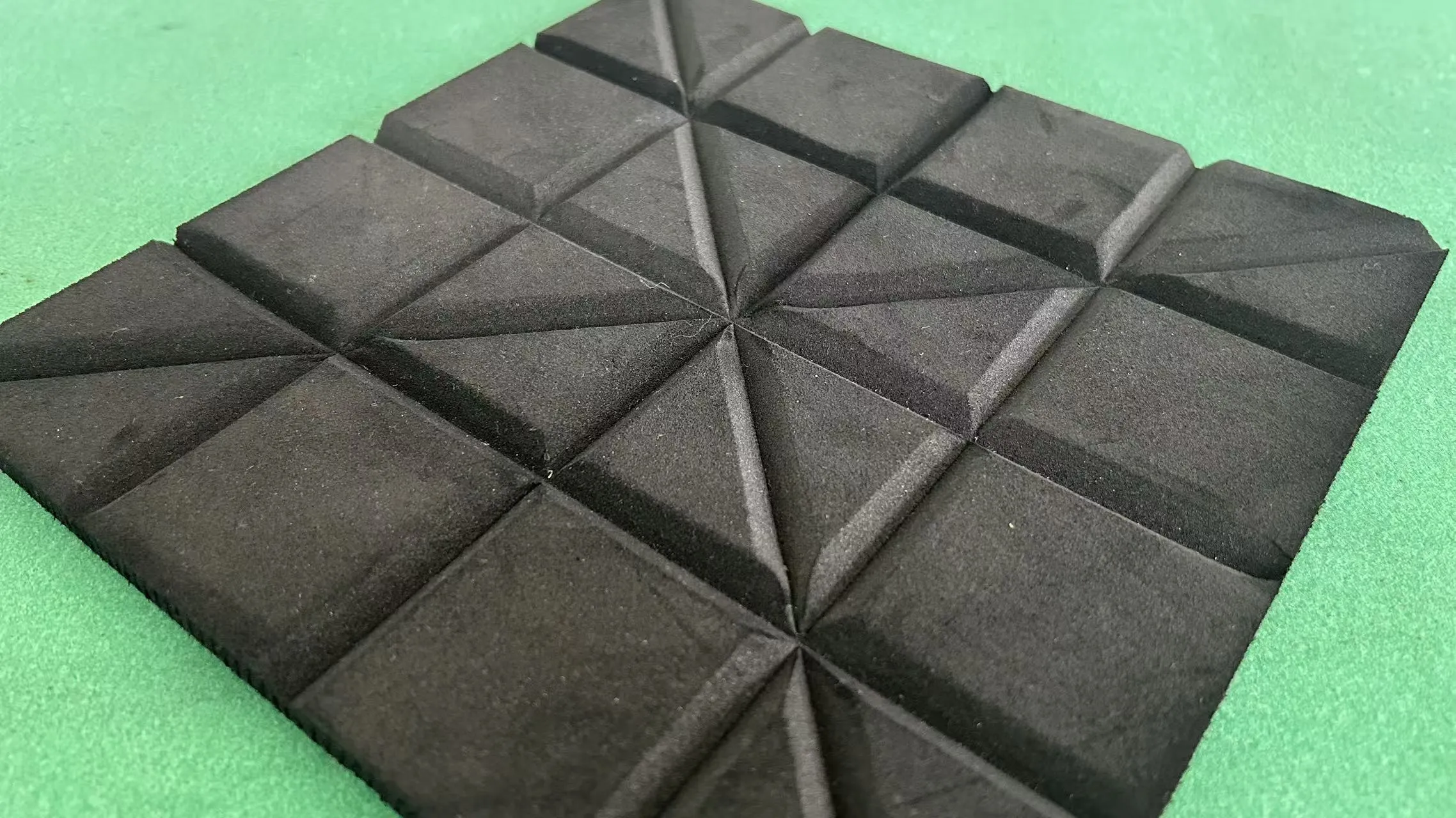Digital cutter cuts sound-absorbing panel, clean V-groove and contour cutting for acoustic materials