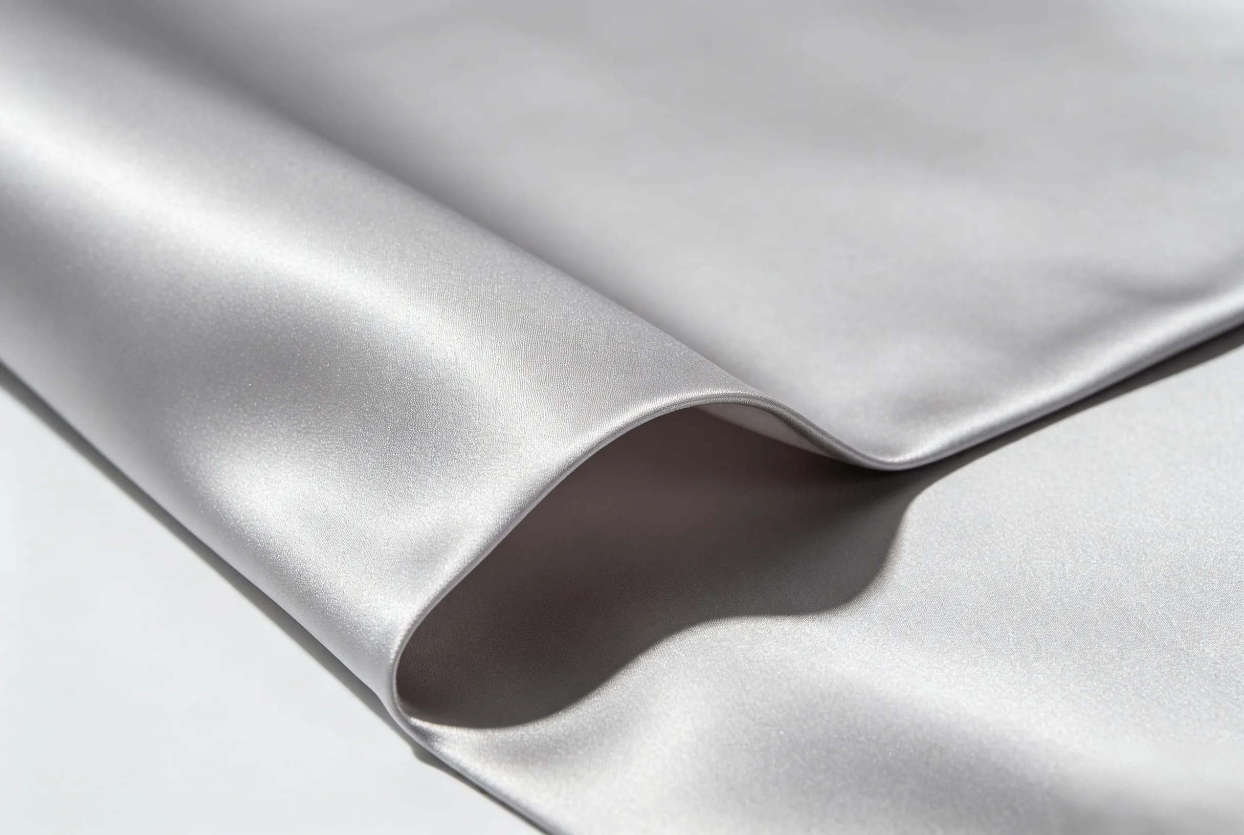 ZINGCUT satin fabric cutting sample, premium silky decorative fabric, burr‑free high‑precision cutting for bags and linings